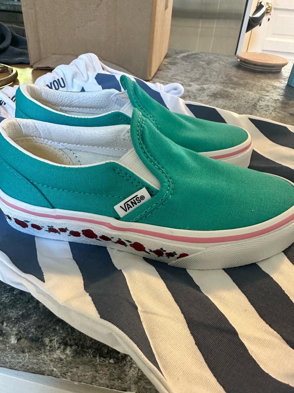 Custom Vans Teal Slip-On Sneakers with Pink Trim and Red Floral Sole
